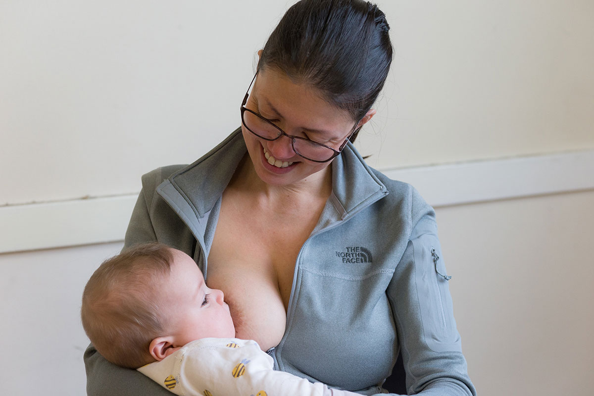 woman breastfeeding babies